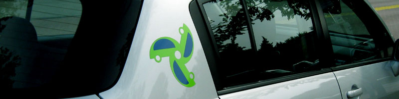 Photo of a car with the Ithaca Carshare logo.
