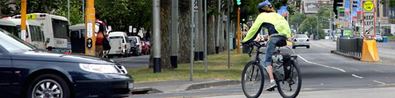 Photo of a bicyclist on a street.